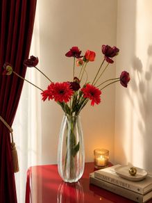 Elegant textured glass vase with decorative faux floral arrangement included