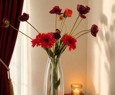 Elegant textured glass vase with decorative faux floral arrangement included