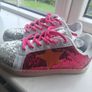 Brand new pink & silver glitter trainers with orange star detail Image 2