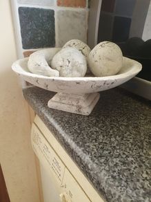 Alabaster fruit in bowl