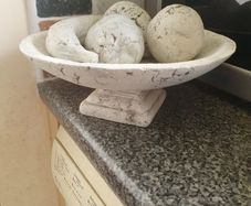 Alabaster fruit in bowl