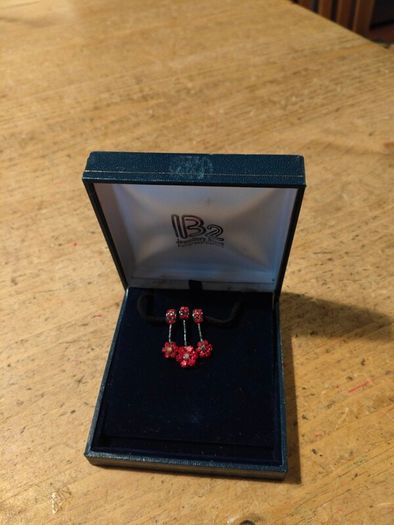 red poppy flower design Necklace  sold by independent jewelers like IB2 Jewellery Store. New in box.