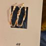 Gold earrings from H&M. Image 2