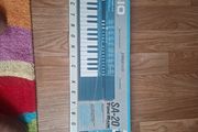 Casio SA-20 Tone Bank is a compact, 32-key vintage electronic mini-keyboard released by Casio in the late 1980s (around 1989).