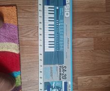 Casio SA-20 Tone Bank is a compact, 32-key vintage electronic mini-keyboard released by Casio in the late 1980s (around 1989).