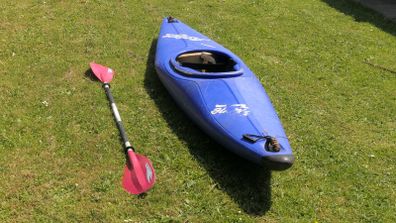 Canoe with Paddle