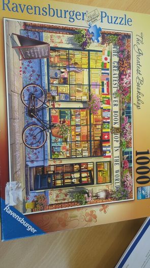 Nine 1000 piece jigsaws for 30