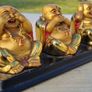 Three brass Buddha figurines Image 2