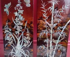 A pair of vintage oriental lacquer and mother of pearl inlay wall pictures
