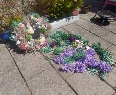 Large selection of artificial flowers plus very large door wreath