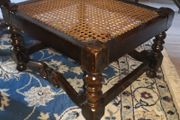 Antique solid wood foot rest with cane top