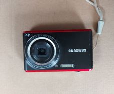 Samsung PL90 Digital Camera, 4 x Zoom, 12.2 Megapixel, Battery charged by afixed USM connector, Issue with the zoom Lens