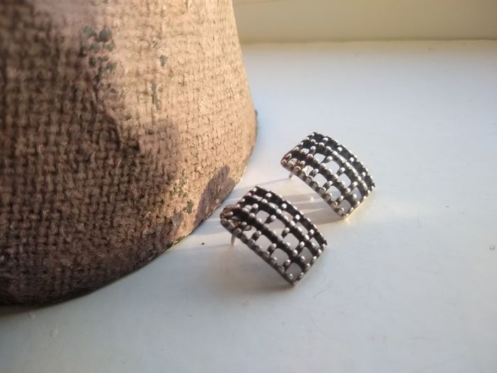 Silver earings.