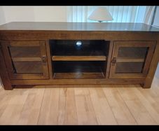 wood TV/media unit with glass doors