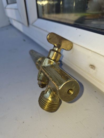 old brass  whiskey  tap