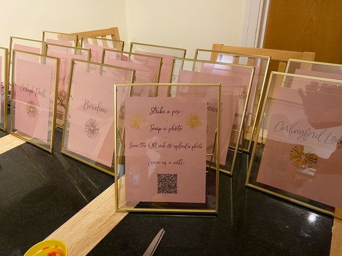 Gold photo frames for wedding table numbers