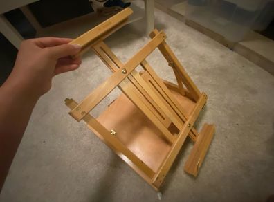 travel easel with storage drawer and mid level brushes and acrylic paints