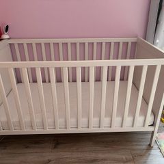 cot bed and mattress in excellent condition