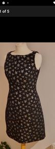 Brand new Warehouse dress size 10 RRP 77e. Free postage