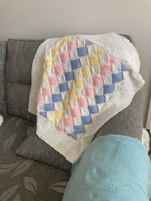 Hand knit colourful blanket