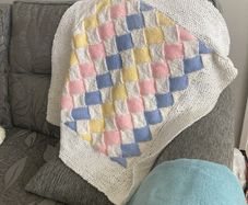 Hand knit colourful blanket