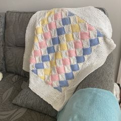 Hand knit colourful blanket