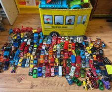 A bunch of hot wheels tracks and cars
