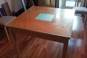 Square glass topped dining table
