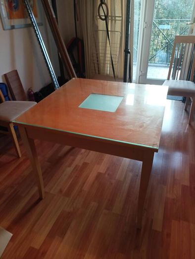 Square glass topped dining table