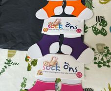 Brand new sock ons (0-6 months)