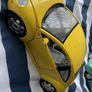 Yellow Volkswagan beetle model car Image 2