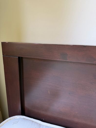 Queen size bed with wooden frame