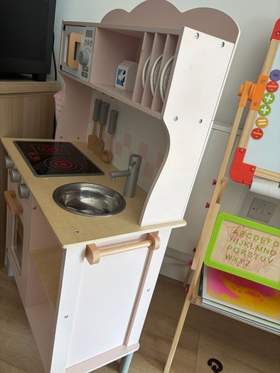 Little girls pink wooden kitchen