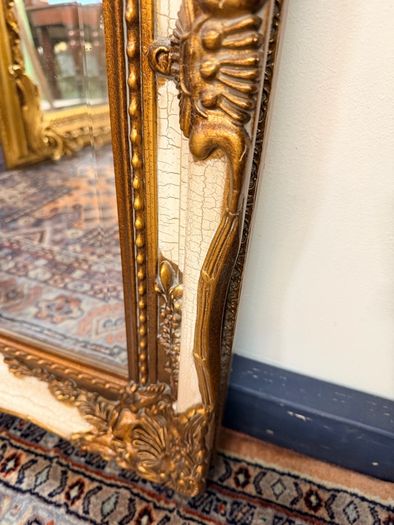 Parcel Gilt and Painted Bevelled Glass Mirror