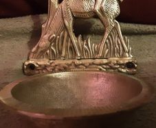 holy water font with deer