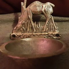 holy water font with deer