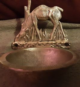 holy water font with deer