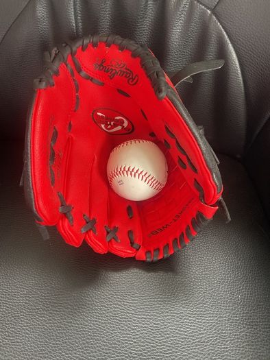 baseball gloves and ball