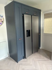 kitchen units from in-house panelling centre in alderley cashmere and navy blue