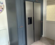 kitchen units from in-house panelling centre in alderley cashmere and navy blue