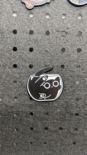 Cute cat in bowl enamel pin