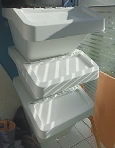 Three large Ikea storage bins