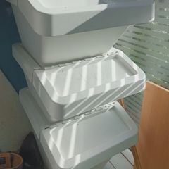 Three large Ikea storage bins