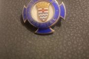 Giles silver nurses badge