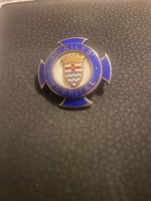 Giles silver nurses badge