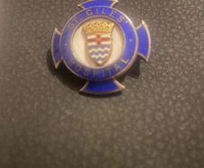 Giles silver nurses badge