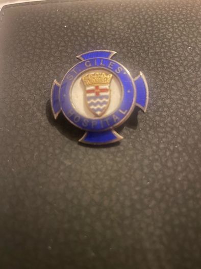 Giles silver nurses badge