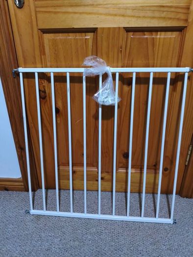 Wall mounted baby gate