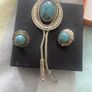 Vintage Southwestern bolo tie set with matching turquoise-style earrings. Silver-tone metal, Western/boho style, good vintage condition. Image 2