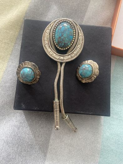 Vintage Southwestern bolo tie set with matching turquoise-style earrings. Silver-tone metal, Western/boho style, good vintage condition.